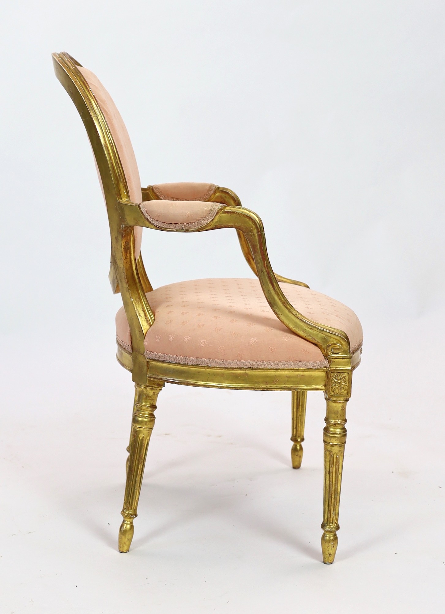 A George III Adam style giltwood armchair, width 61cm height 93cm